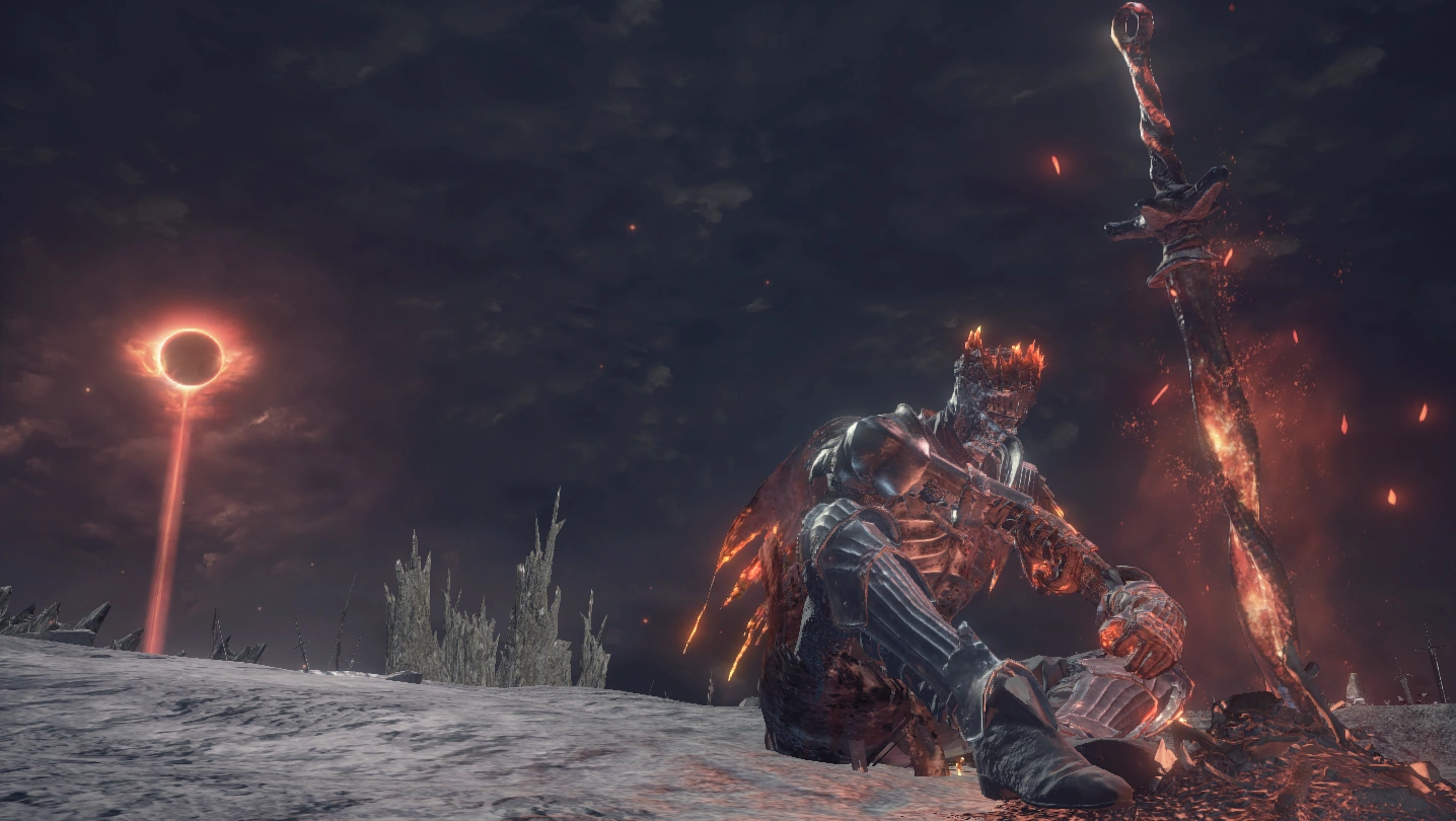 Перед началом боя сидит у костра.