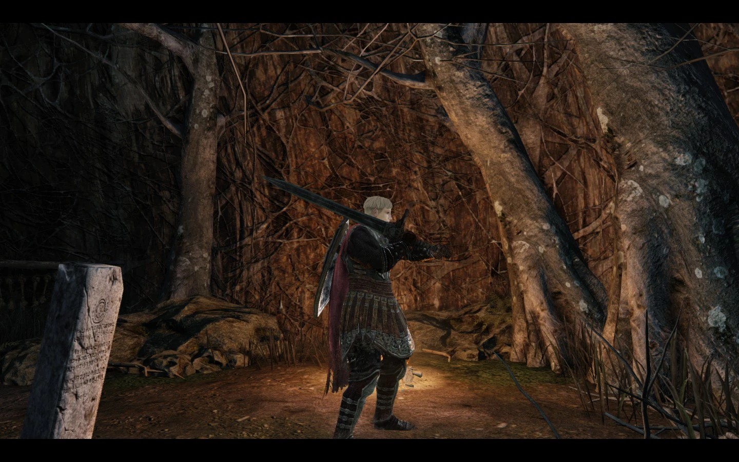 На плече в двуручном хвате.