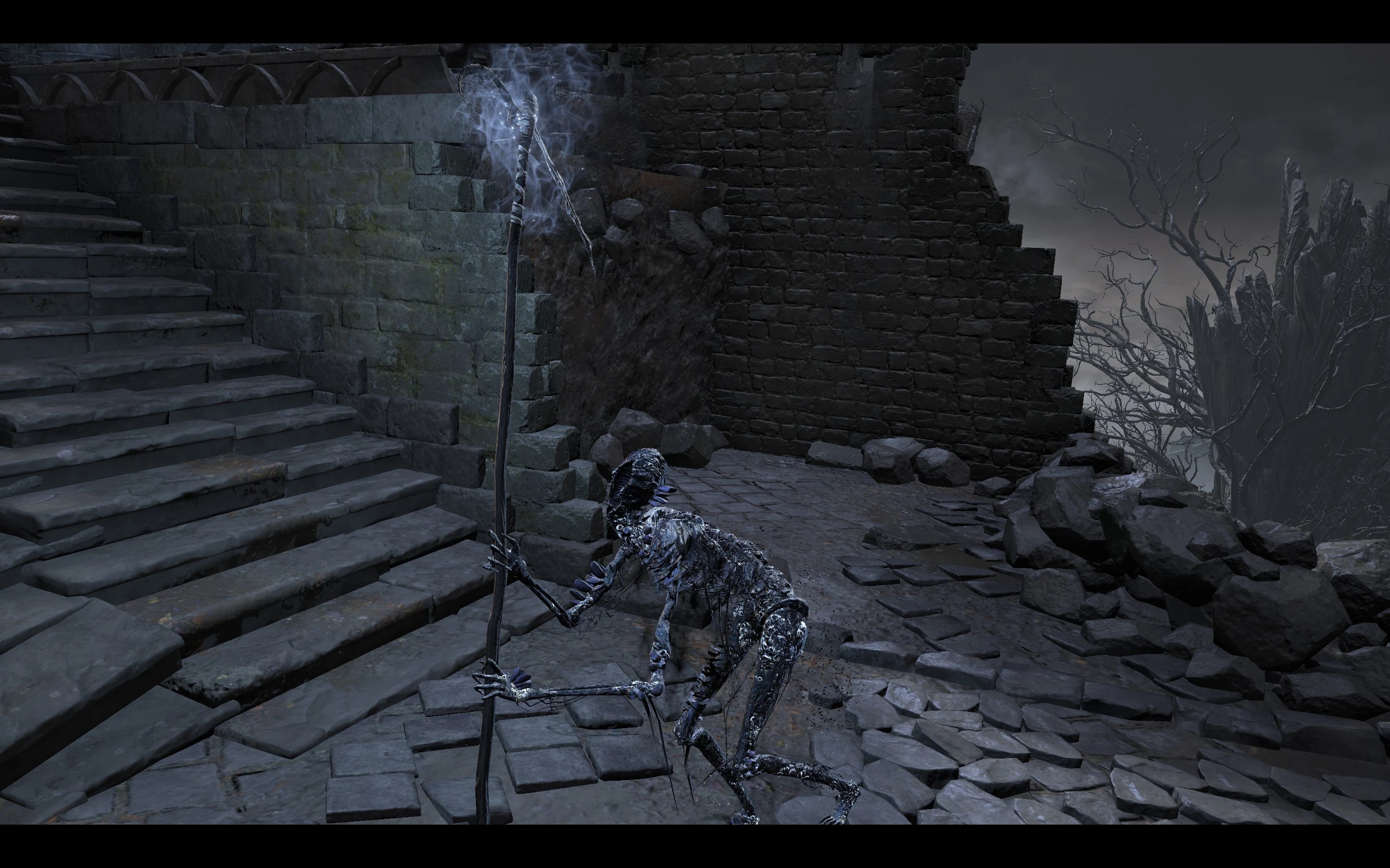 Обитатель глубин с посохом.